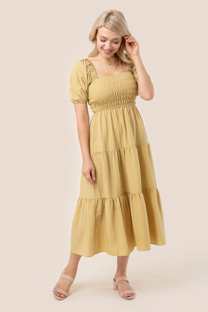 Tiered long dress with puff sleeves